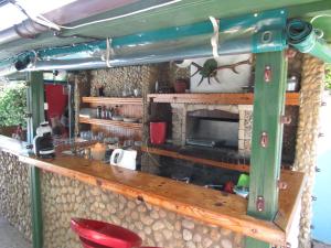 a kitchen with a counter in a room at Hostel Papagal in Varna City