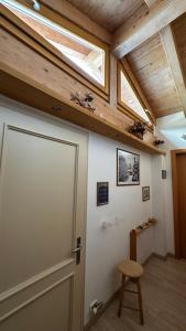 a garage door in a house with a skylight at Agritur Due Valli in Livo