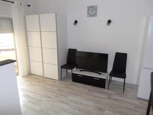 Posezení v ubytování Estudio Clube dos Arcos