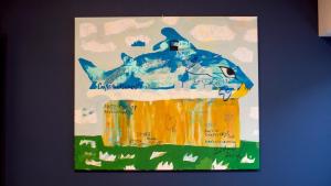 a painting of a fire hydrant on a wall at Harbor base SHARK in Sado