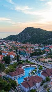 an aerial view of a town with a mountain at Mozaik Apartments in Oludeniz