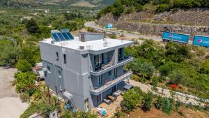 an aerial view of a house with a solar panel on it at Vila Andrea in Himare