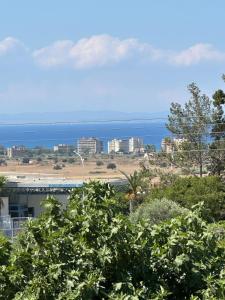 a view of the ocean from a house at Bliss Getaway Near Protaras in Paralimni