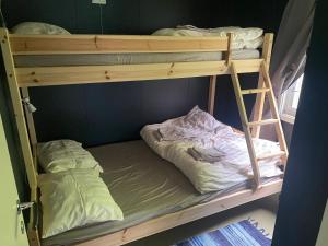 a couple of bunk beds in a room at Tiritoppen Cabin in Loen