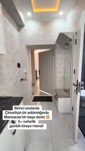 a bathroom with a sink and a toilet in a room at Terras Astara in Astara +13 photos
