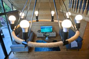 an overhead view of a living room with a large rope around a table at Verde Motsameta in Motsameta +42 photos