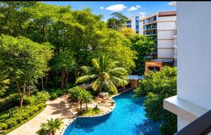 an aerial view of a resort with a swimming pool at The Title Residencies Naiyang in Phuket +22 photos