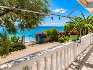 a balcony with a view of the ocean at Wonderful Sea View in Borsh
