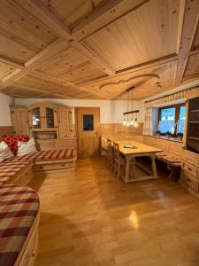 a large room with a table and a dining room at Haus Krone in Lähn