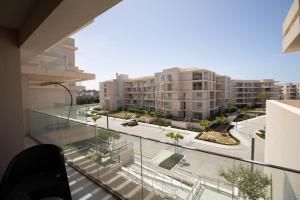 a view from the balcony of an apartment building at Marina Marassi in El Alamein