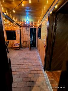 a room with a hallway with lights on it at Cabaña Nido de Niebla en San José del Pacífico in San Jose del Pacifico