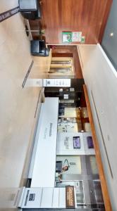 a display case in a store with books on display at Sercotel AB Rivas in Rivas-Vaciamadrid
