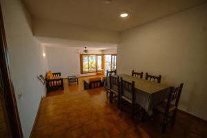 a dining room with a table and chairs at Primestay - Chalet Panamá - Piscina y Vistas al Castillo in Peniscola
