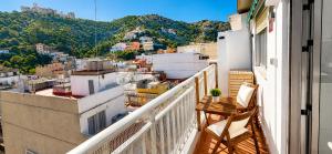 a balcony with a view of a city at Vistas al castillo in Cullera