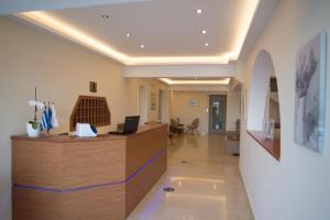 a lobby of a hospital with a reception desk at Oasis Boutique Hotel in Nydri +67 photos