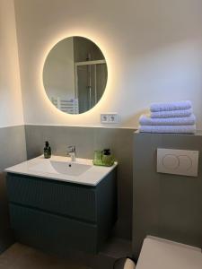 a bathroom with a sink and a mirror at Zimmer Room Trogir Kastela Split in Kaštela