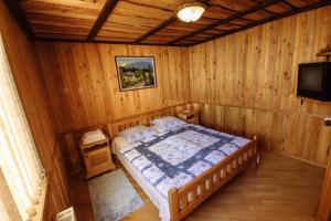 Postel nebo postele na pokoji v ubytování Korona Karpat