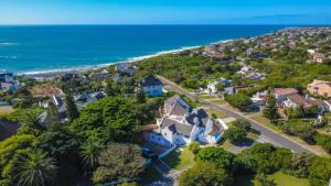 an aerial view of a house and the ocean at Eden on Walton 1 in Sea Vista