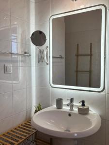 a bathroom with a sink and a mirror at Onar House IV in Achladies