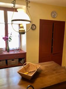 a room with a table with a box on top of it at Les volets bleus in Gresse-en-Vercors