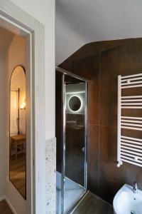 a bathroom with a shower and a sink at Chioggia Rooms in Chioggia