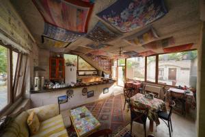 a view of a room with a kitchen and a living room at Glory Art Stone House in Göreme