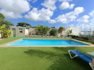 a swimming pool in the yard of a house at Pueblos blancos in Vejer de la Frontera