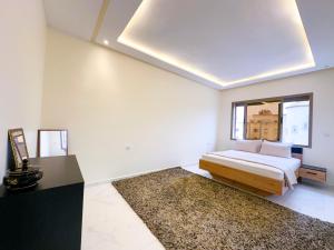 a bedroom with a bed and a window at Apartment in Azemmour in Azemmour