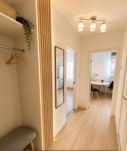 a hallway with a mirror and a dining room at Modi Line Vee in Valga