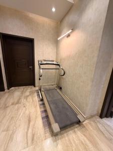 an empty room with a ramp in a room with a door at Private villa in Lahore