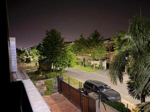 a car parked on a driveway in front of a house at Private villa in Lahore