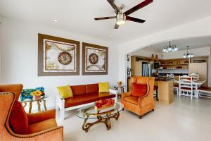 a living room with a couch and chairs and a table at Dog-Friendly Villa with Heated Outdoor Pool, Hot Tub, Streaming, Partial Views in Rosarito