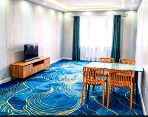 Et tv og/eller underholdning på DONI HOTEl