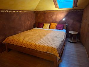 a small bedroom with a bed in a tent at Ferienwohnung Rieder in Wörgl