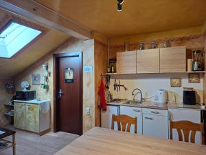 a kitchen with a sink and a counter top at Ferienwohnung Rieder in Wörgl