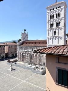 a view from the roof of a building with a tower at Antica Residenza Dell'Angelo in Lucca