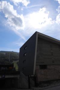a building with a roof with a sky at Bjelašnica Escape in Bjelašnica