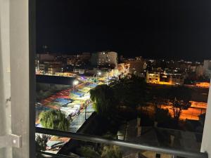 a view of a city at night at Garsol in Oruro