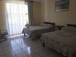 Ένα ή περισσότερα κρεβάτια σε δωμάτιο στο Balcon Gueela