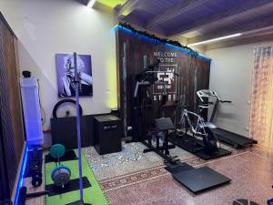 a room with a gym with a bike in it at Casa Costanza 25 in San Cipirello