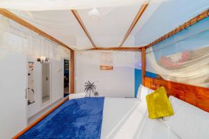 a bedroom with a bed and a window at Zanzibar,Fumbatown 2 Bed Ocean view Apartment in Fumba +90 photos