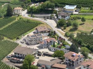 an aerial view of a house in a village at Mas de le Contesse in Ton