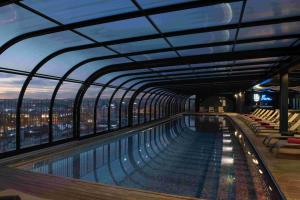 a swimming pool on the top of a building at Upon Lisbon Prime Residences in Lisbon