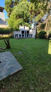 a white house with a lawn in front of it at LenPui I in Ostende +46 photos