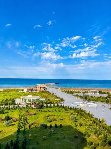 an aerial view of a park next to the ocean at Panorama in Sumqayıt +8 photos
