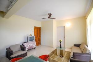 Μια τηλεόραση ή/και κέντρο ψυχαγωγίας στο Sunshine Park Homes - Benaulim at Micon