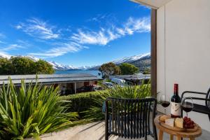 a balcony with a view of the mountains at Lake & Mountain Views, Close to Shops & Dining in Queenstown