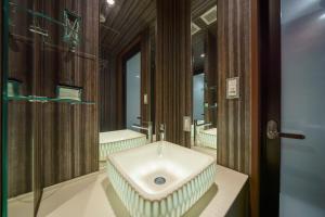 a bathroom with a sink and a shower at Beautemps in Osaka +63 photos