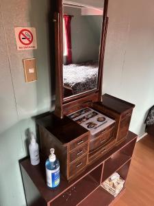 a mirror sitting on top of a dresser at Nikko Park Lodge Mountain Side in Nikko +76 photos