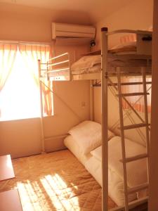 Krevet ili kreveti na sprat u jedinici u okviru objekta Tokyo8home Hachioji